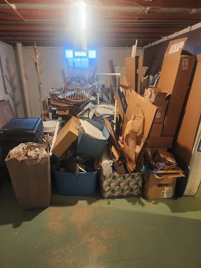 Roll-off dumpster container at job site for 2 Yard Dumpster Rental in Lake Panasoffkee